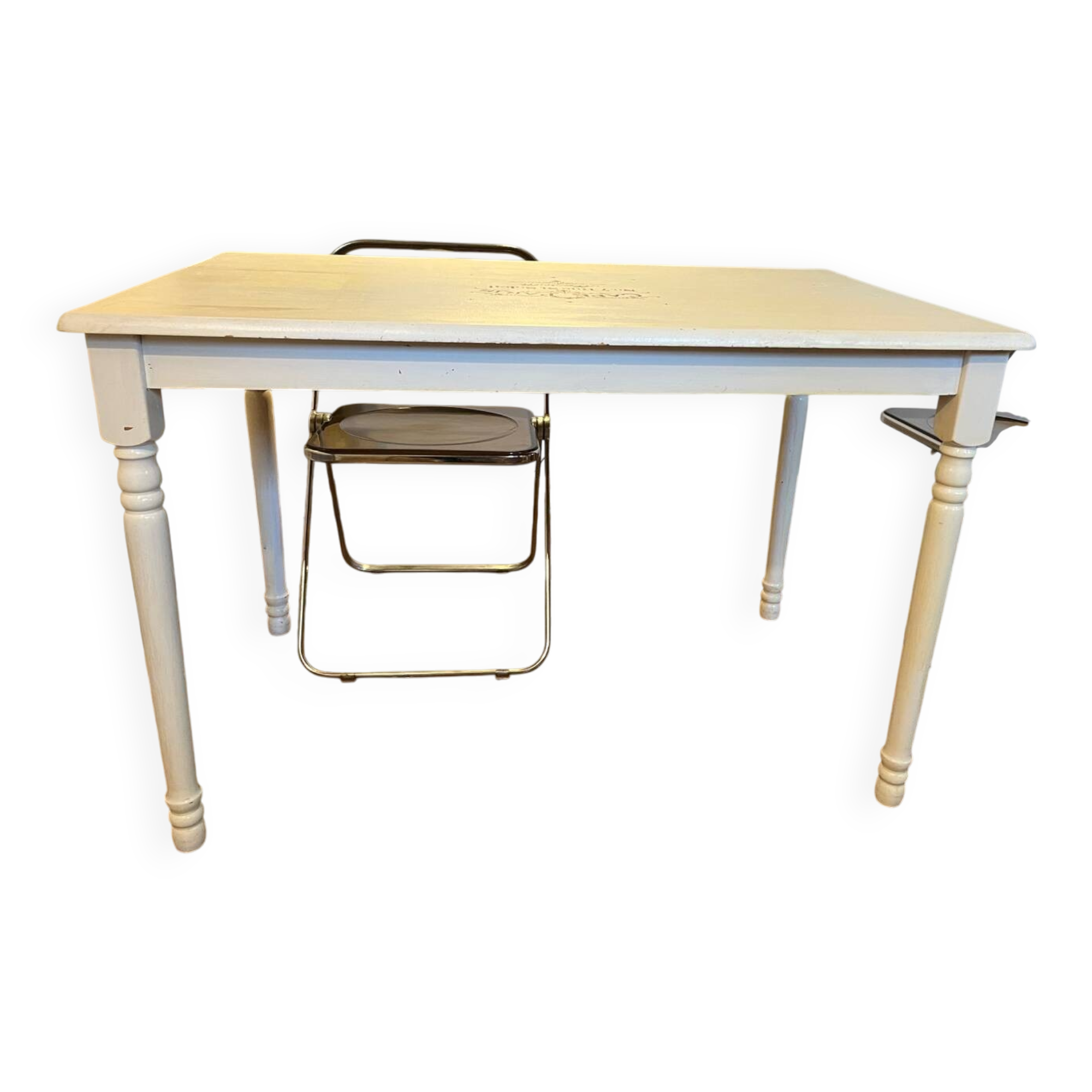 Farm table with a cream patina.