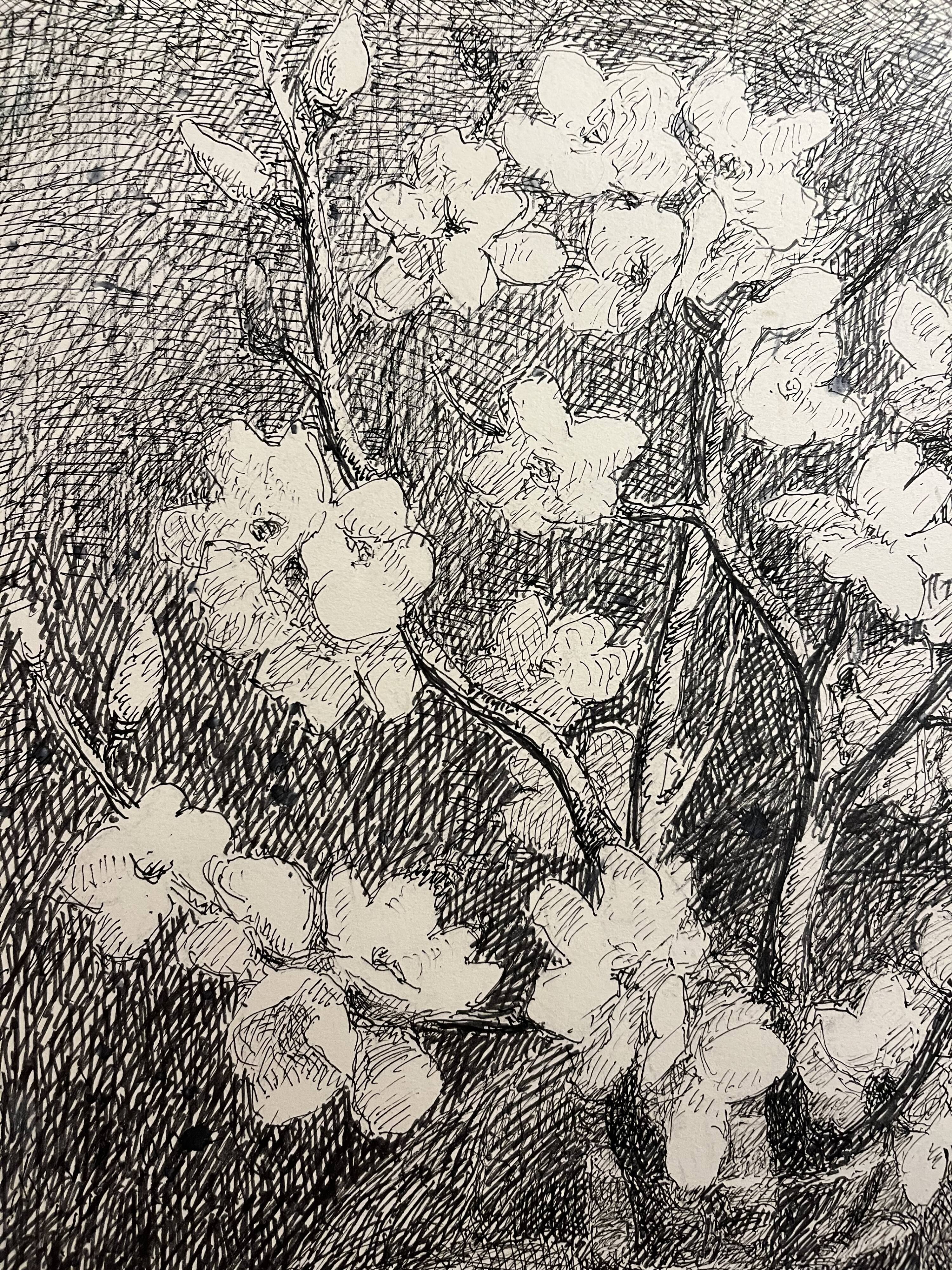 Almond branches in bloom in a glass of water