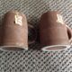 Series of 2 sandstone mugs