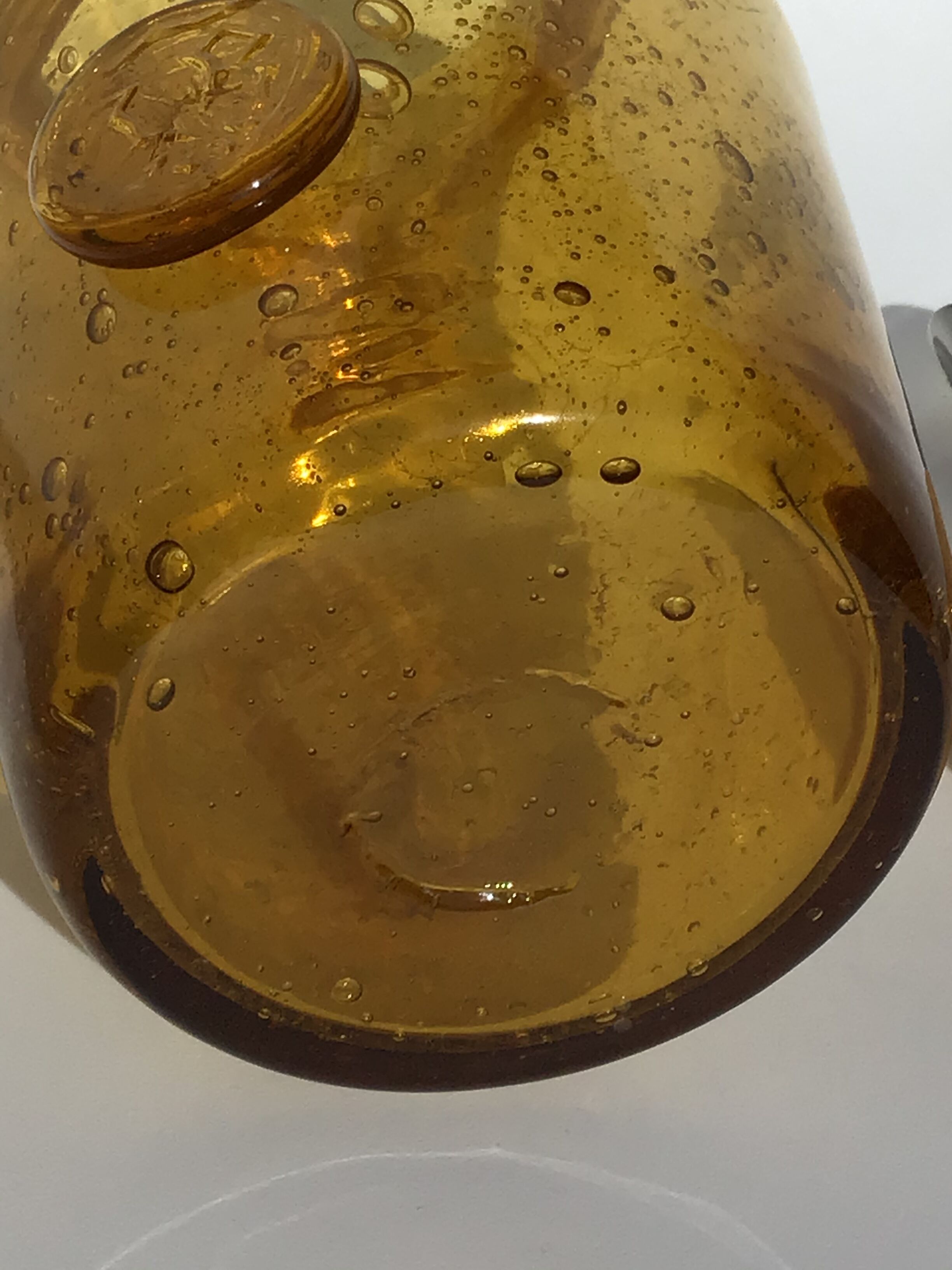 Amber bubbled glass jar La Rochère