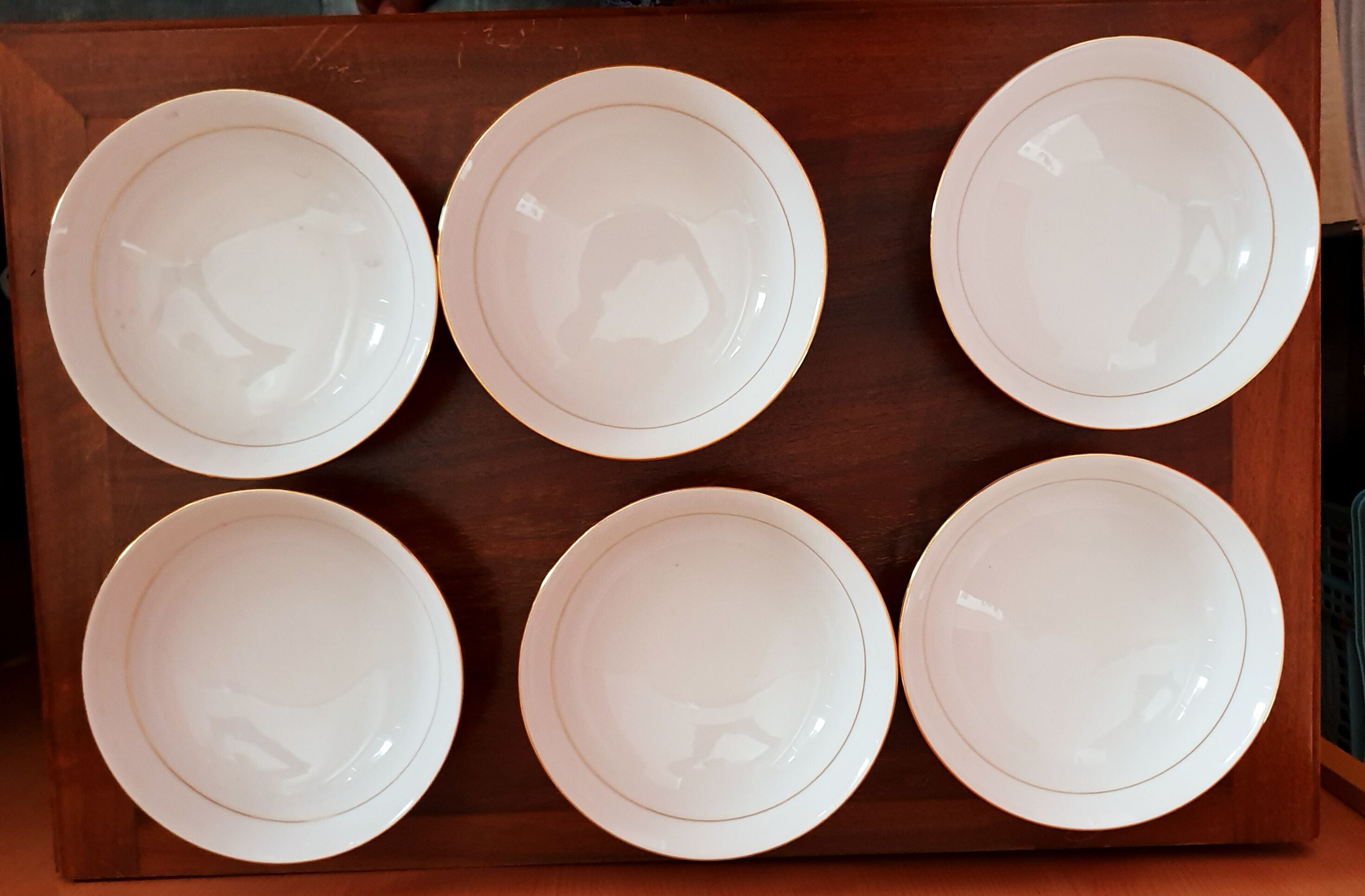 6 hollow plates gold edged in Limoges porcelain