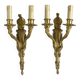 According to Jean-Charles Delafosse (1734-1791). Pair of bronze wall sconces.