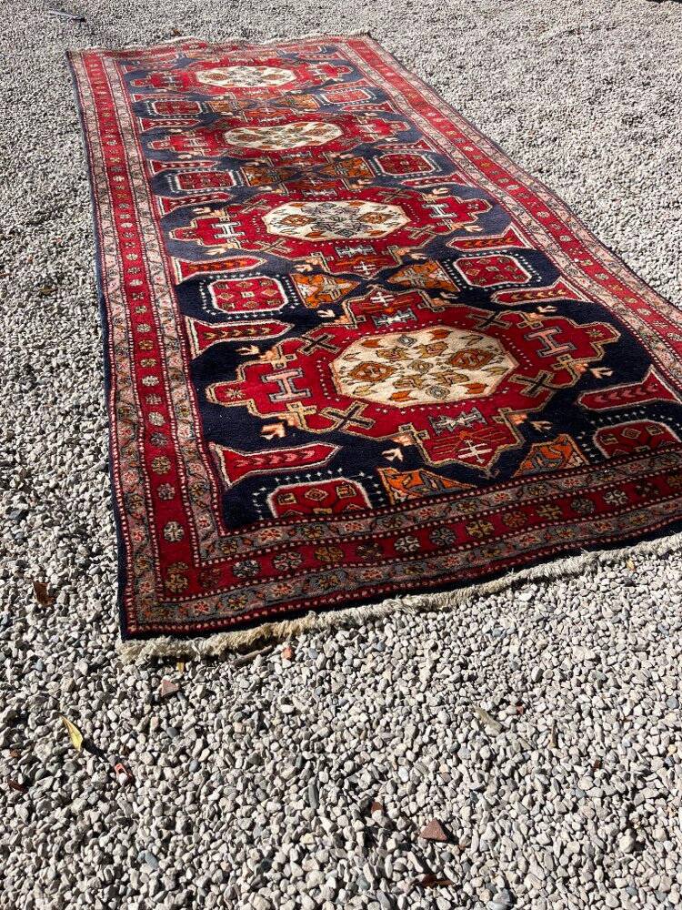 Long antique Persian carpet