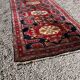 Long antique Persian carpet