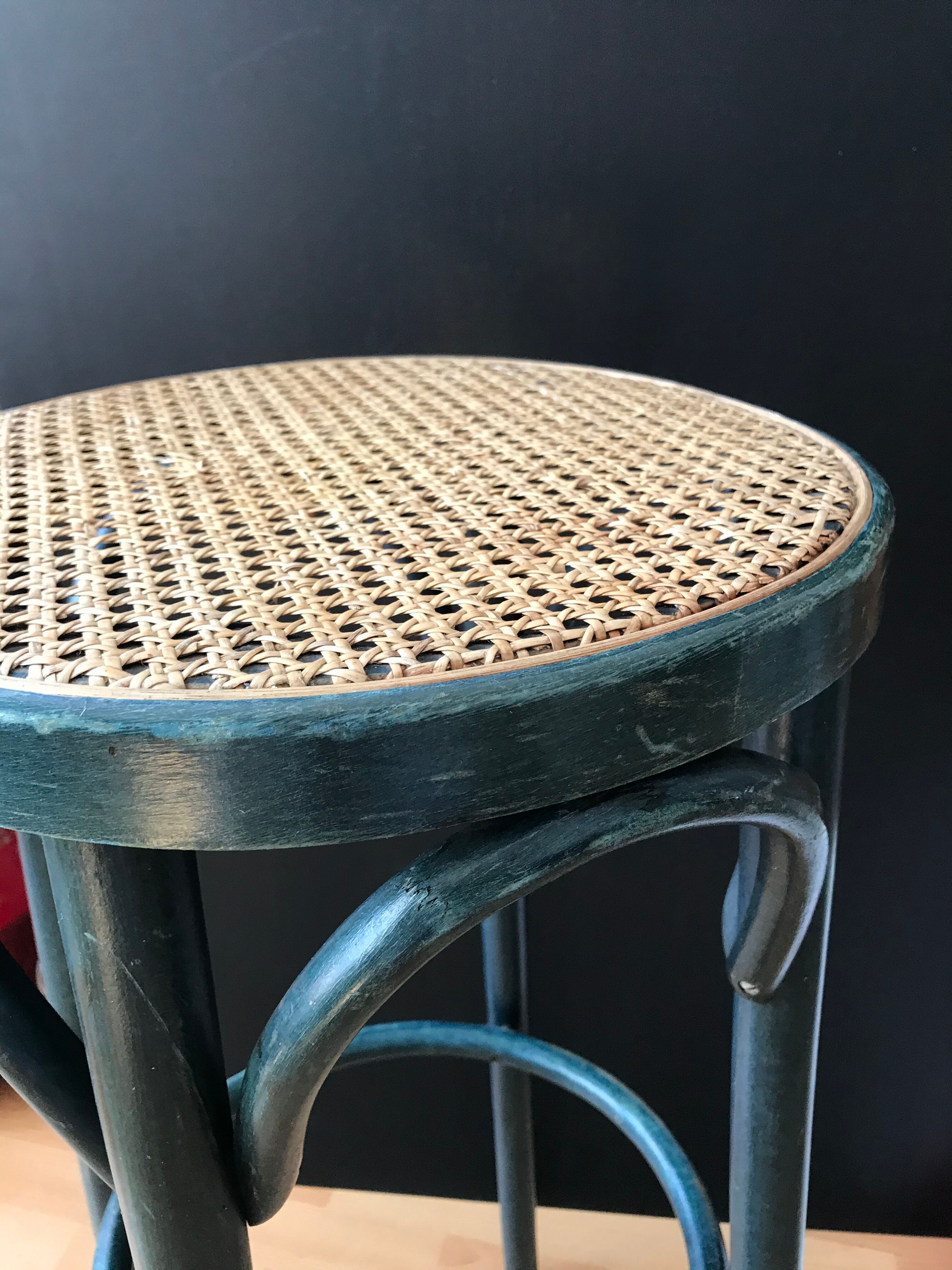 Curved wooden bar stool