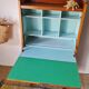 Vintage 1950s wooden secretary with tapered legs and mint interior.