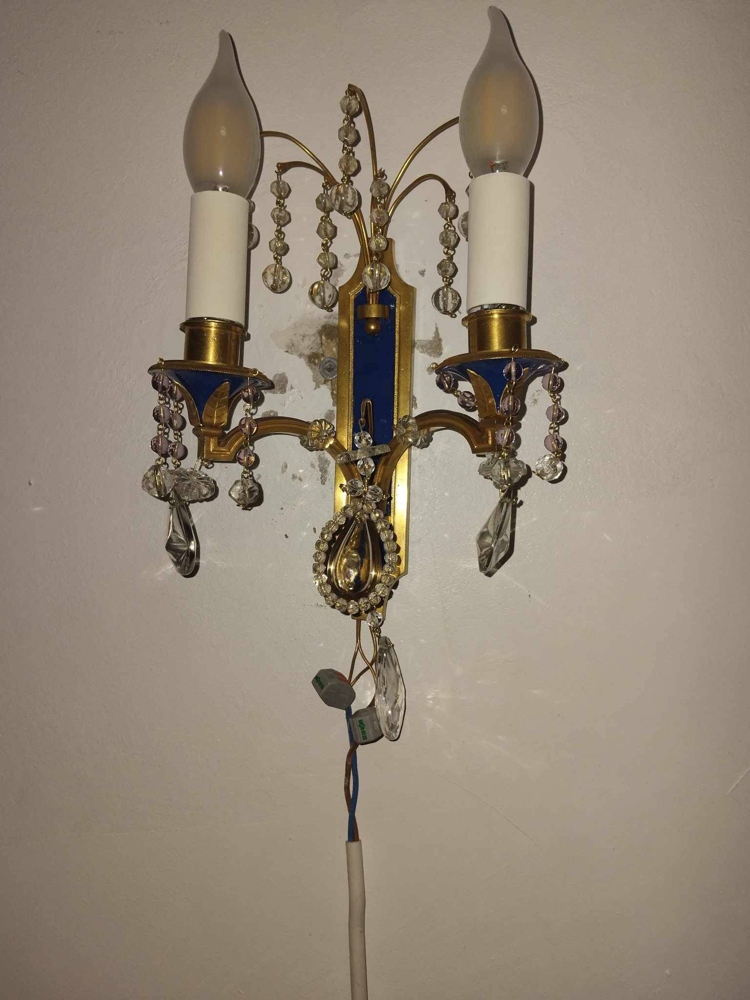 Pair of Louis XVI style gilt bronze wall lights