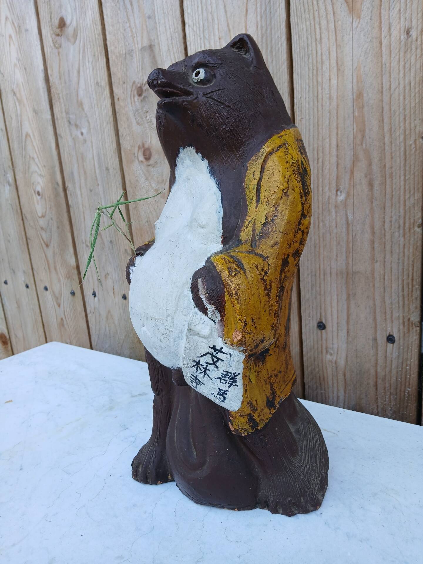 Tanuki statue in handcrafted terracotta