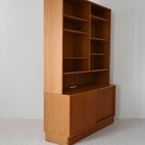 Scandinavian bookcase with storage compartment