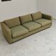 Pierre Frey modernist bench in green and gold patterned fabric