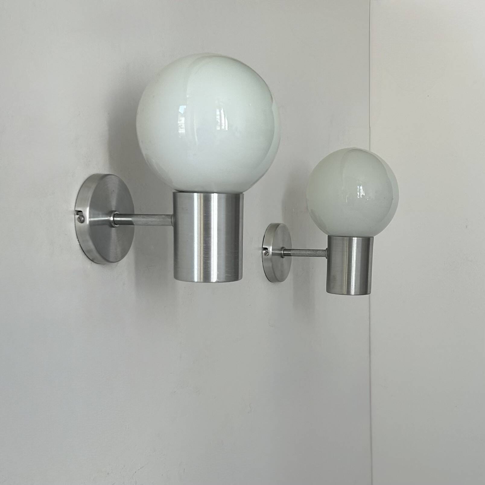 Pair of vintage wall lights, aluminum and opaline, France, 1980