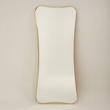 Golden brass mirror in the style of Gio Ponti. 1980s or 1990s.