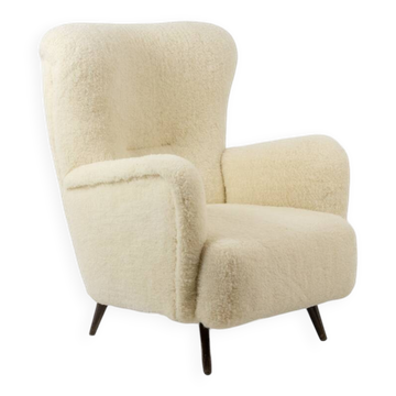 Fauteuil, ou bergère, avec son tissu à bouclettes. Années 1950