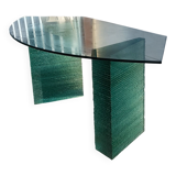 Solid glass desk with a half-moon top.