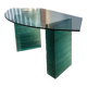Solid glass desk with a half-moon top.