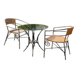 Garden table and wrought iron chair