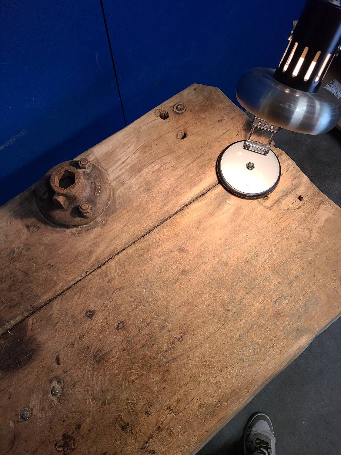 Vintage workbench circa 1930, folding metal leg.