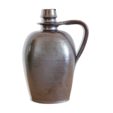 Old Norman bottle in brown ceramic