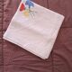 Vintage square linen tablecloth hand-embroidered with floral patterns — 1950s/60s