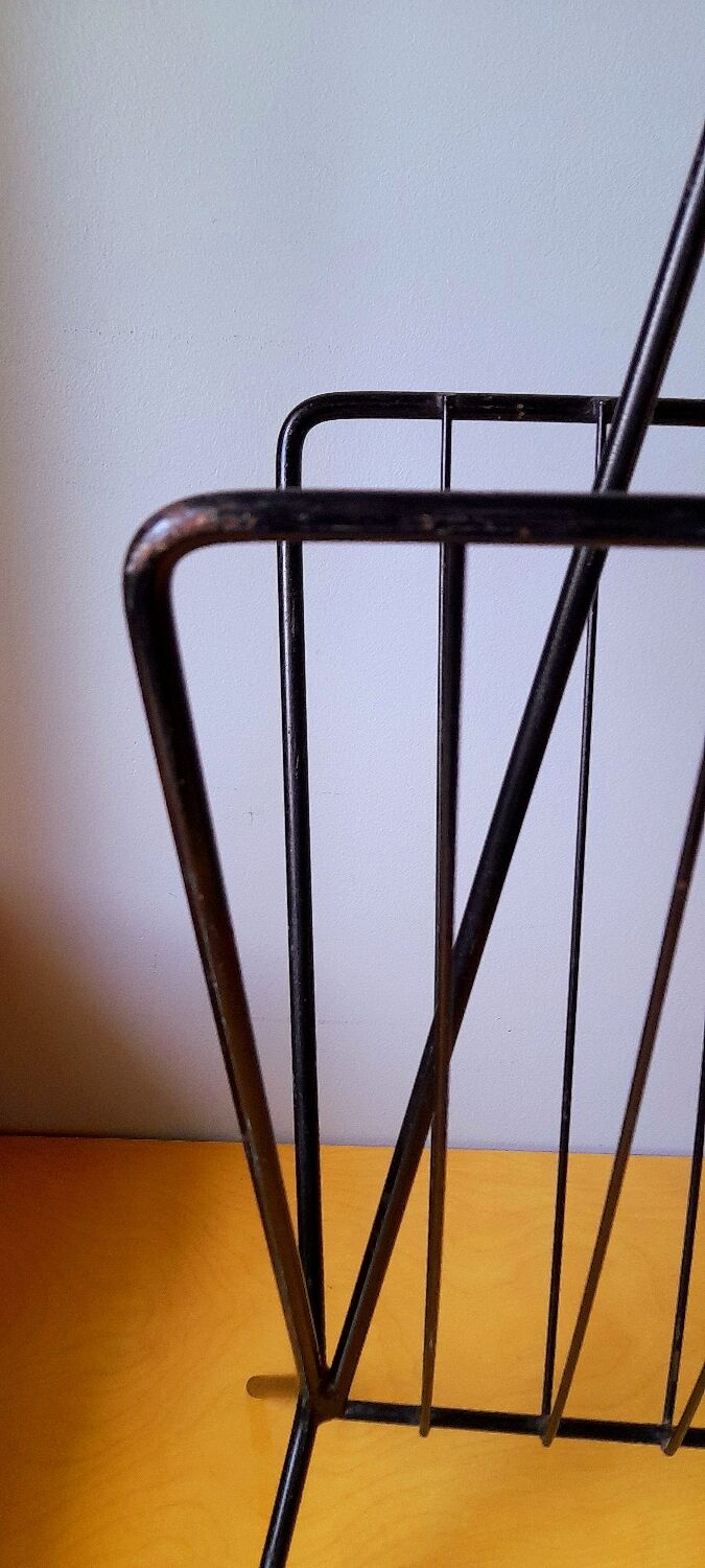 Metal magazine holder