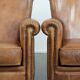 Set of two vintage sheepskin armchairs with beautiful and warm colours