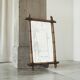 Grand miroir faux bambou en bois massif et miroir patiné, début XXe siècle