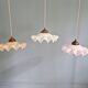 Art Deco trio of suspensions in coloured frilled opaline, 1920-30.