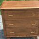 Vintage oak commode with tapered legs from the 1950s.