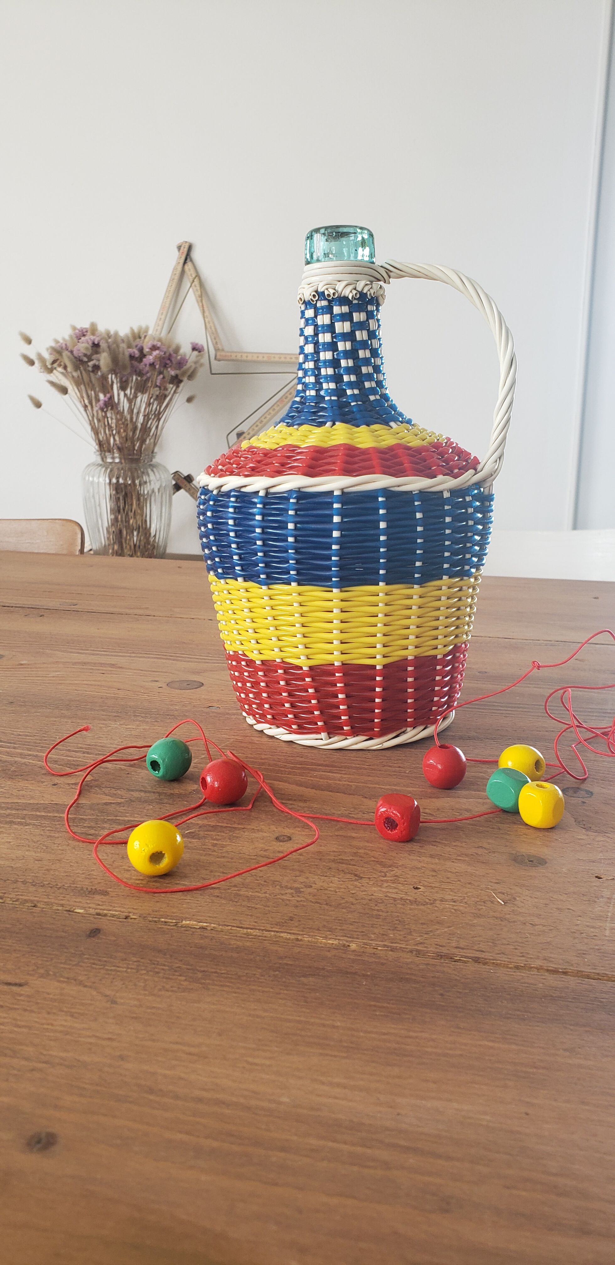 Multicolored scoubidou bottle