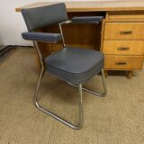 Old wooden desk and armchair
