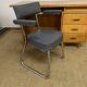 Old wooden desk and armchair