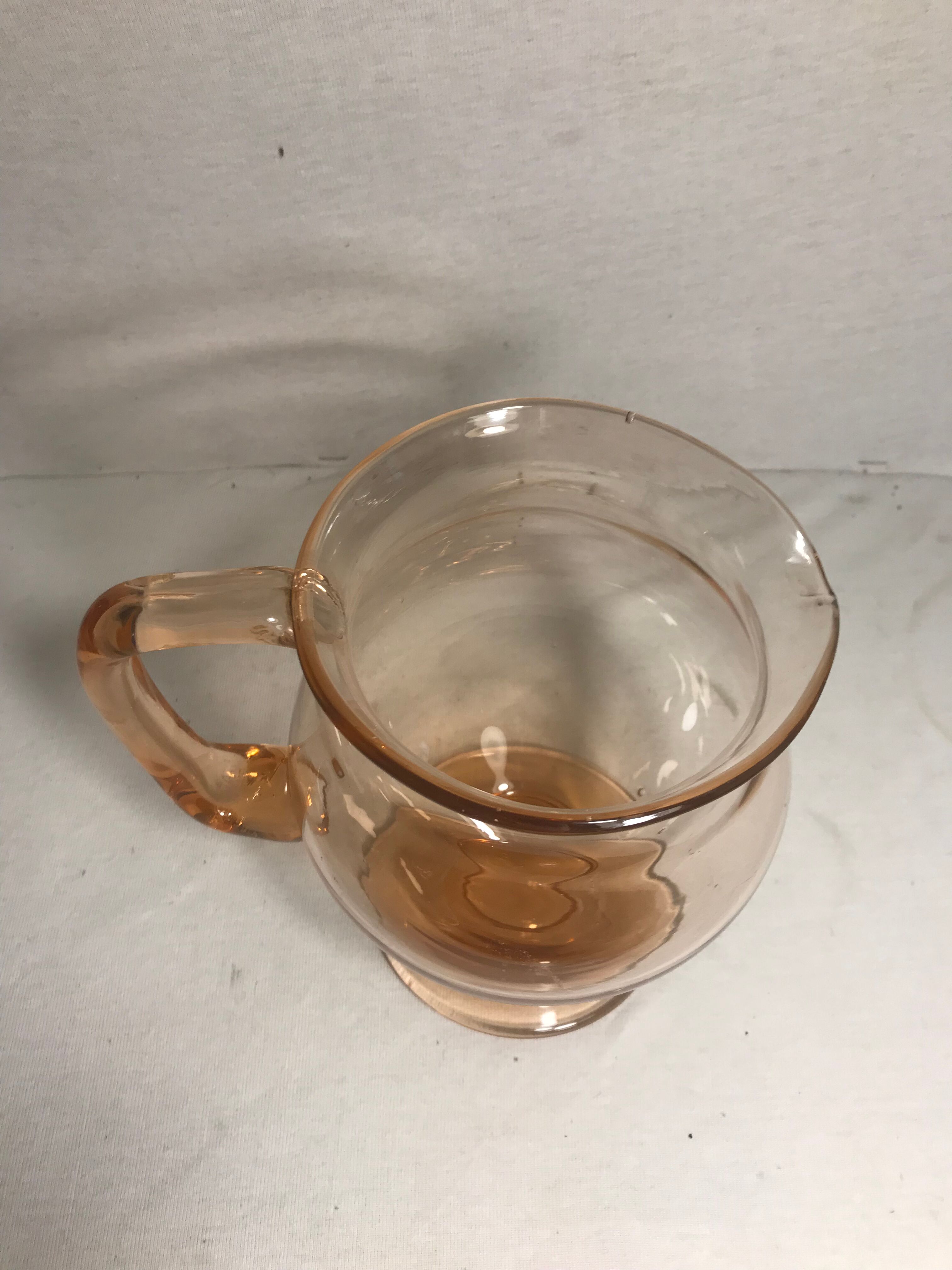 Pink pitcher in bubble glass