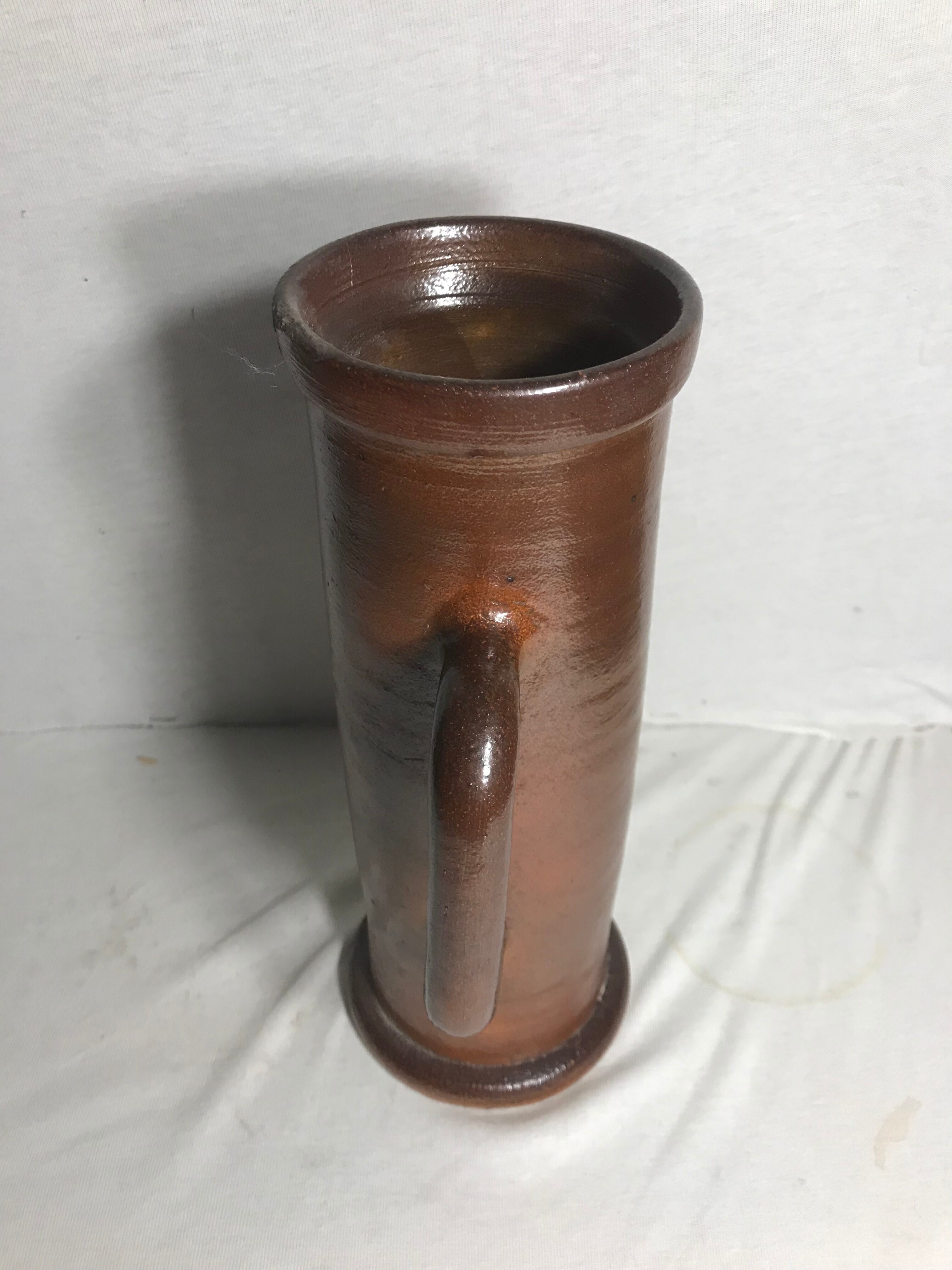 Old pitcher top in brown sandstone 70s