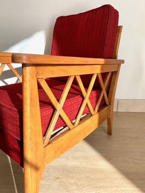 Pair of vintage wooden armchairs with braces