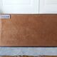 Letter holder covered in leather and golden metal by roche design