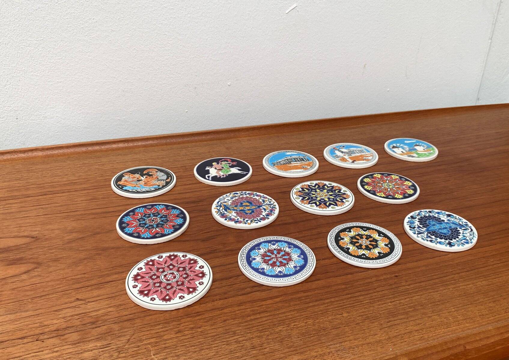 Set of 13 vintage ceramic coasters handmade by Lito Niarchos.