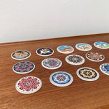 Set of 13 vintage ceramic coasters handmade by Lito Niarchos.