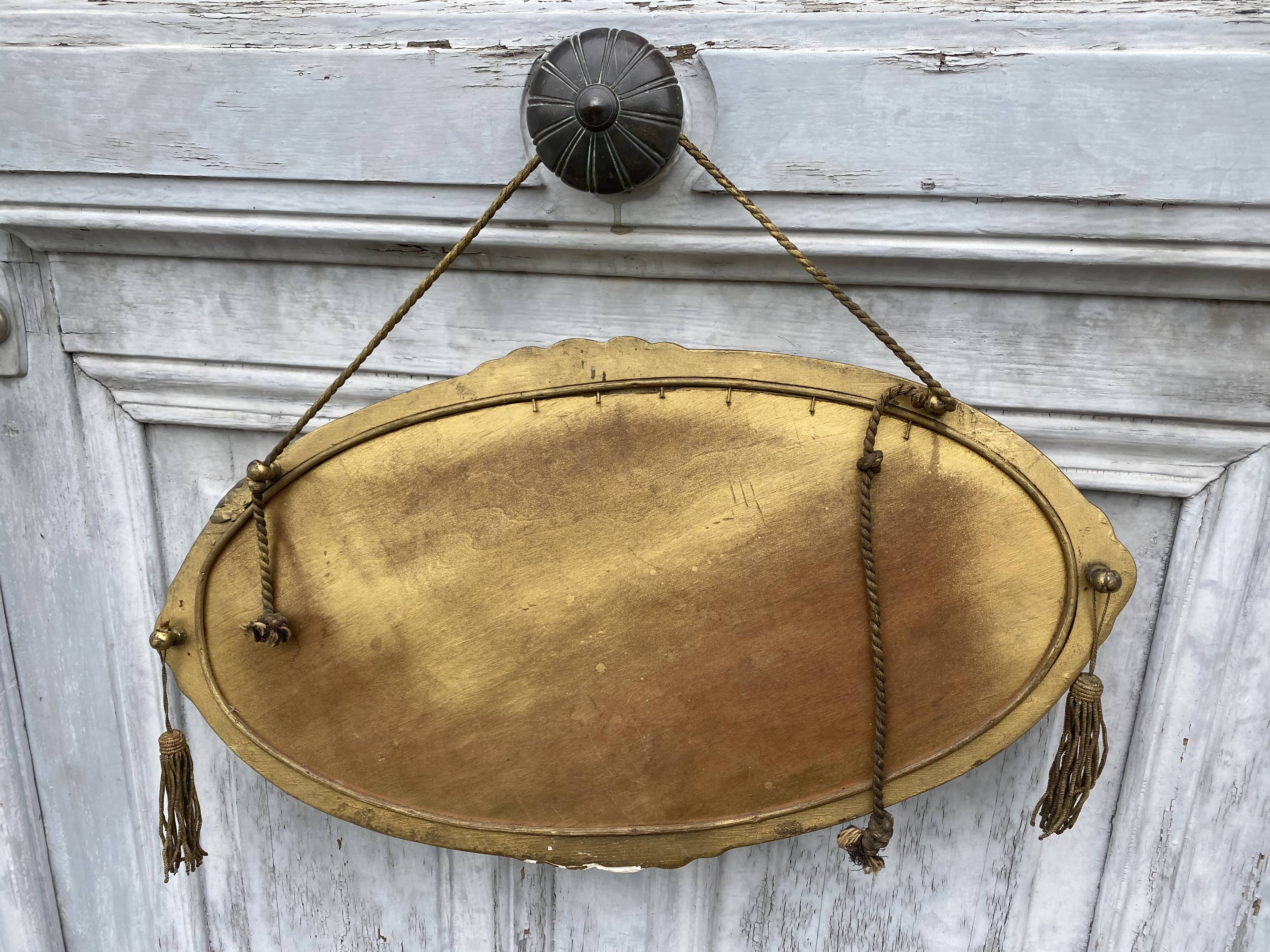Miroir ovale art déco avec pompons