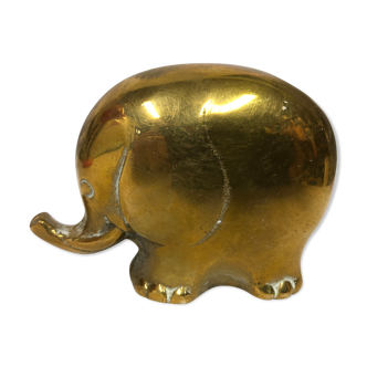 70s golden brass elephant paper press