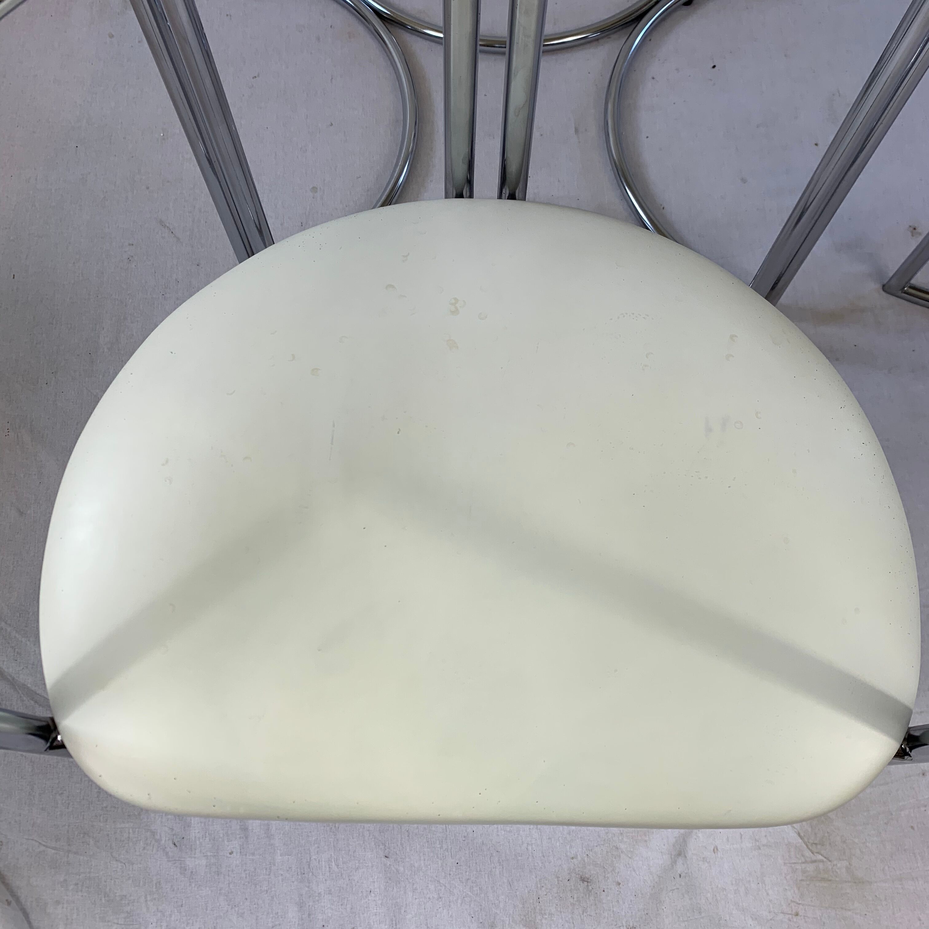 Chrome table and two modernist chairs