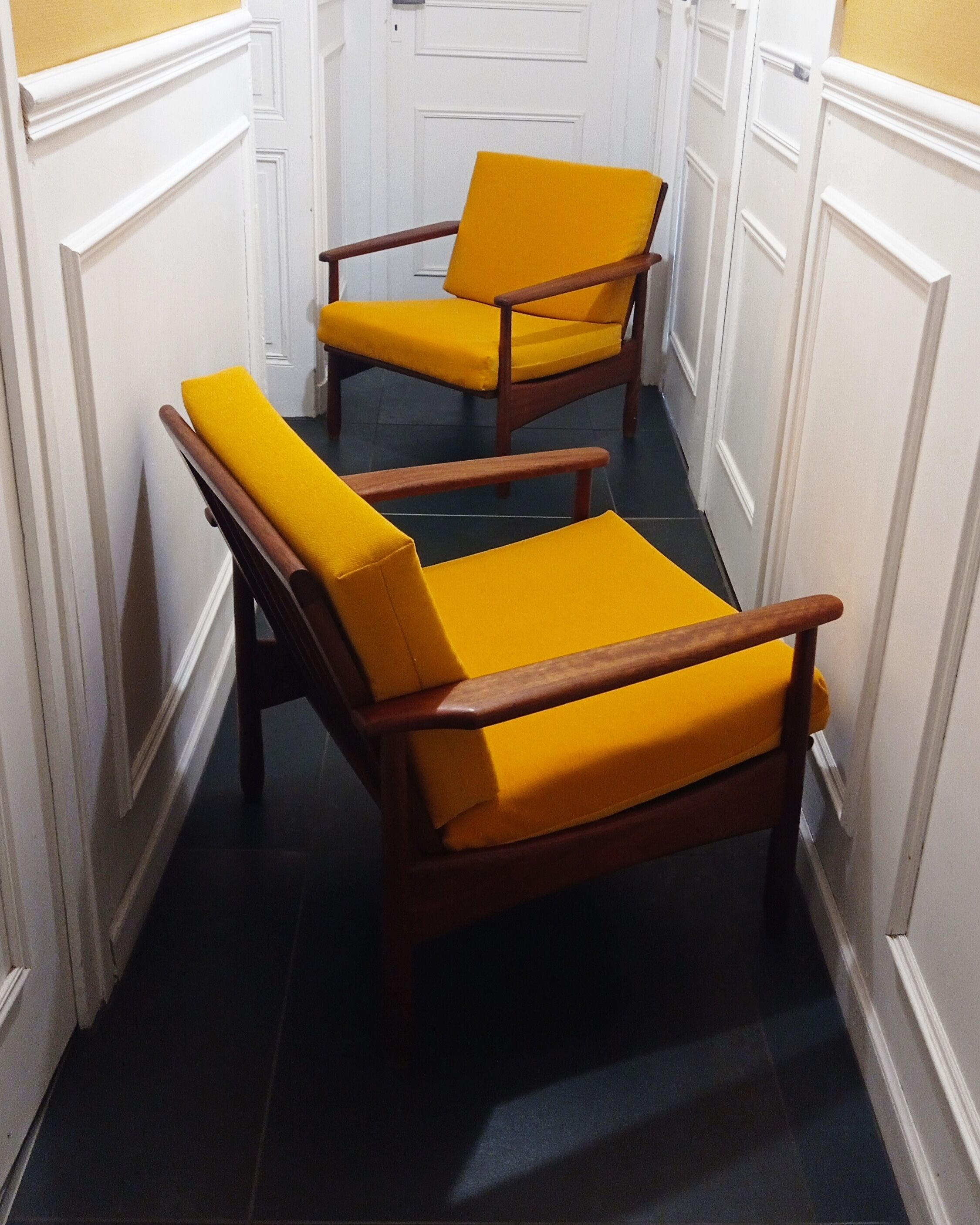 Pair of teak armchairs