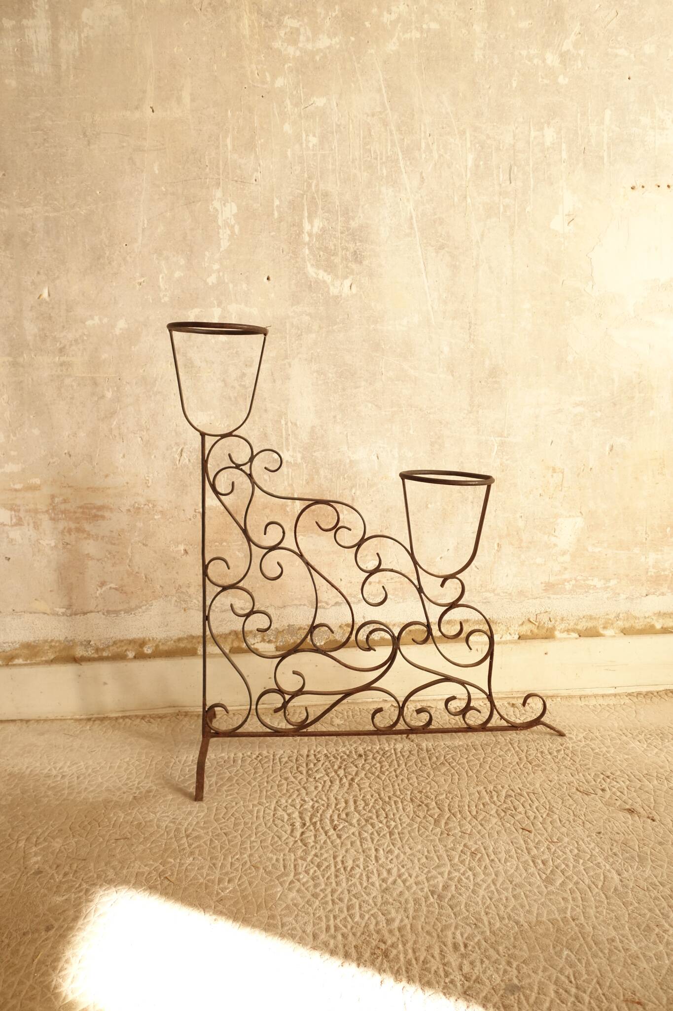 Antique wrought iron plant stand