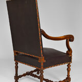 Louis XIII office armchair in leather and walnut carved around 1860