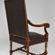 Louis XIII office armchair in leather and walnut carved around 1860