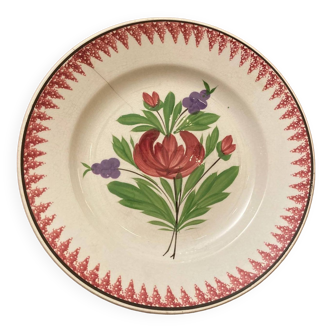 Old plate with red peonies