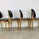 4 chaises Pégases Baumann, noires, années 60
