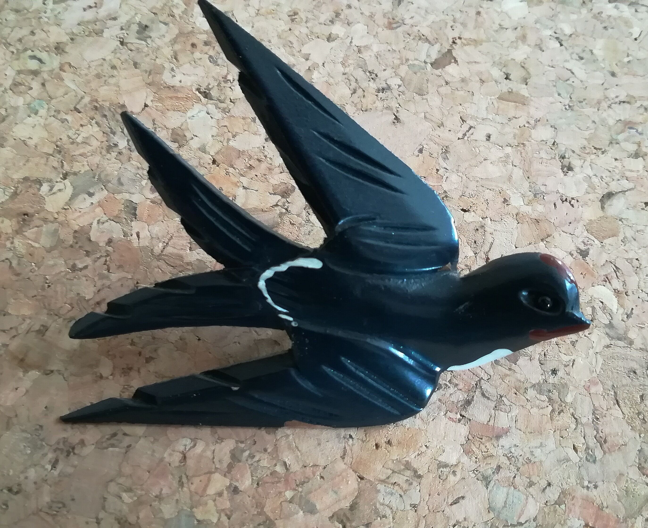 Three old wooden wall swallows