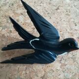 Three old wooden wall swallows