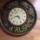 Antique advertising wall clock "vins d'alsace" in solid wood decorated