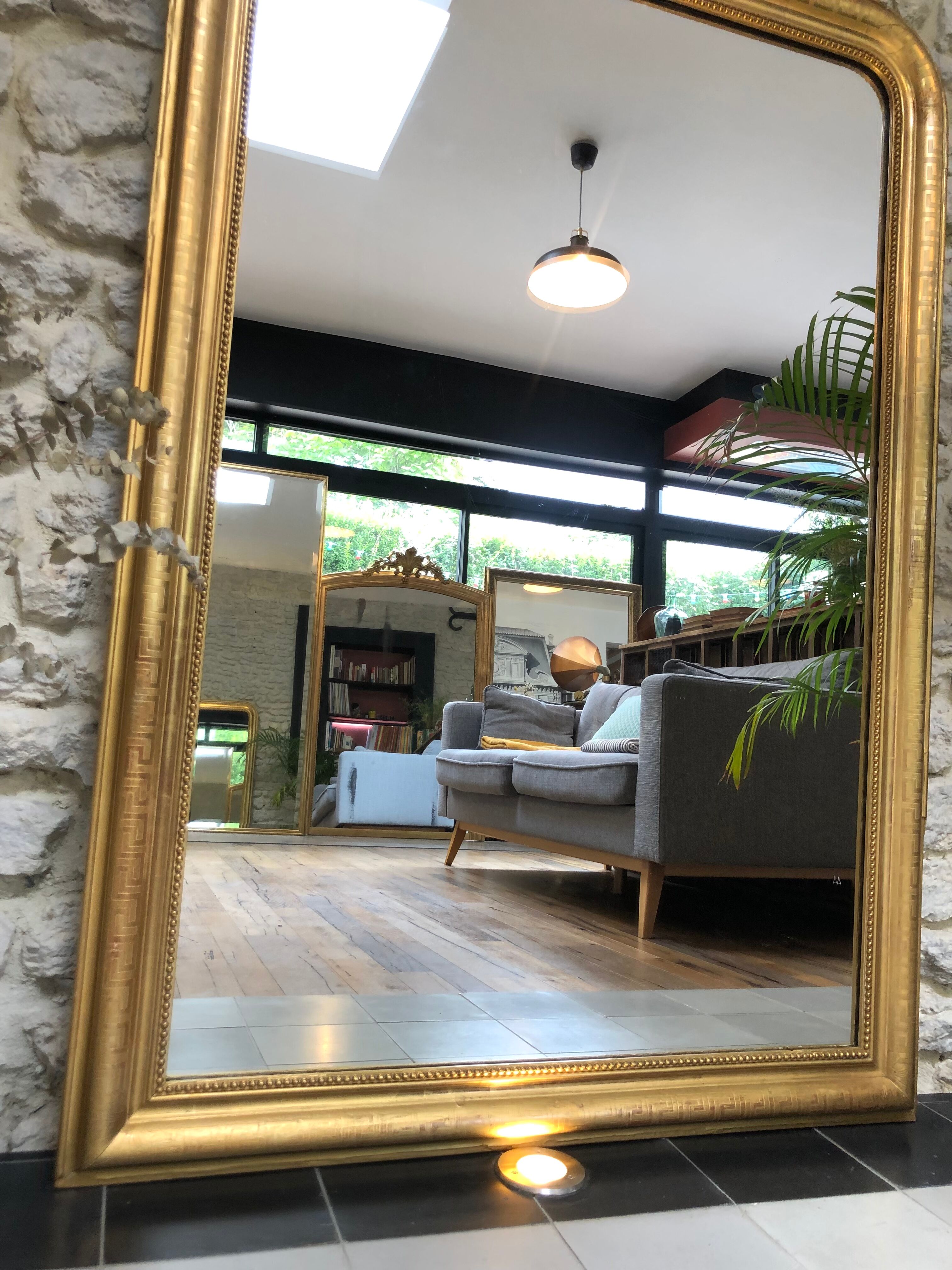 Louis-Philippe mirror pearled gold with gold leaf, some imperfections 146cm / 101cm